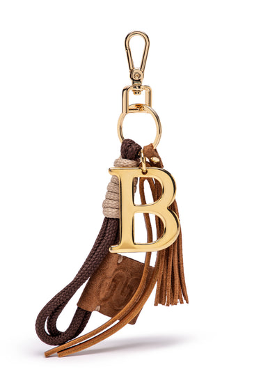 Gold-tone BAMBURI B keychain with braided cord, brown leather tassel, clasp and key ring
