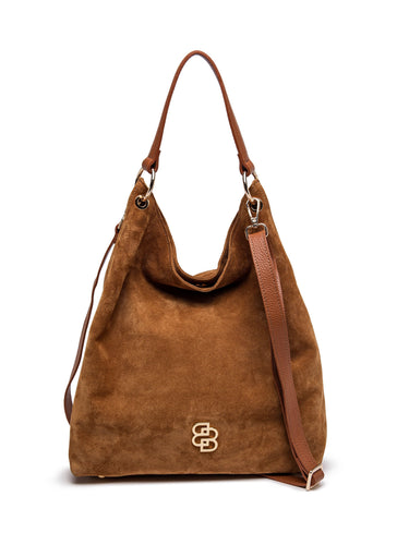 Front studio view of a cognac BAMBURI suede hobo bag with shoulder handle and crossbody strap