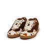 Sapatilhas em pelo cow print e pele