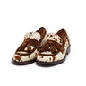 Mocassins em pelo cow print com borlas